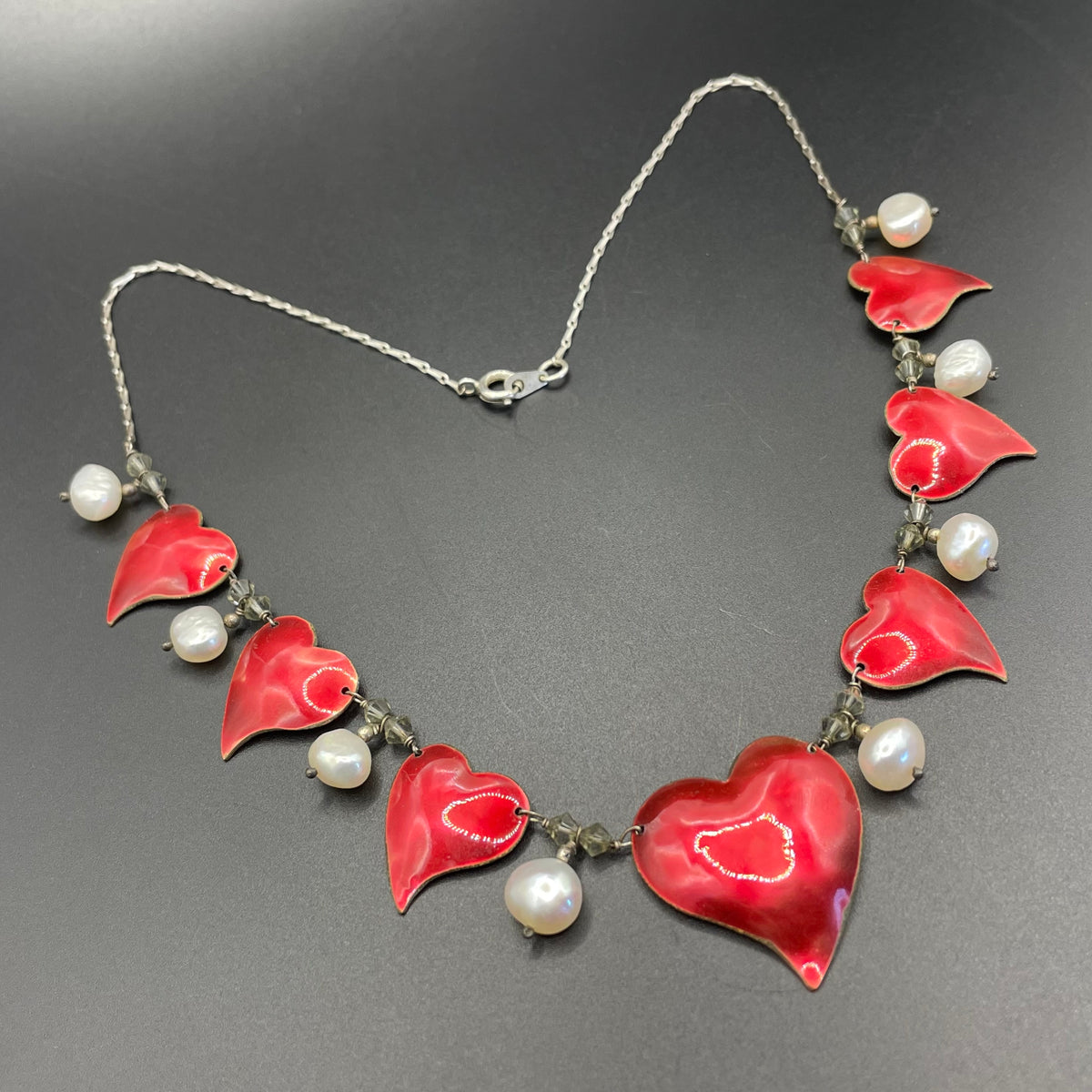 Vintage unsigned Scandinavian sterling silver, gold tone and red enamel love heart necklace with real freshwater pearl and crystal drops