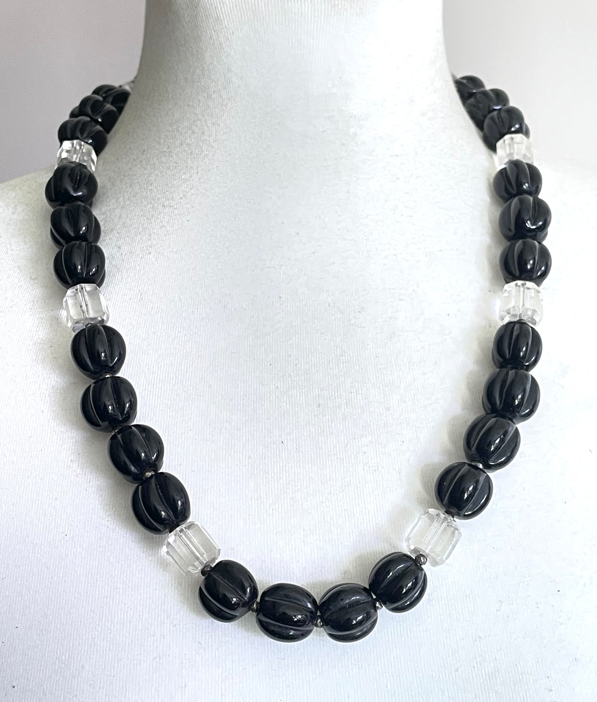 Vintage Art Deco chunky clear crystal faceted bead and carved black glass melon / pumpkin bead necklace, heavy poured glass, longer length