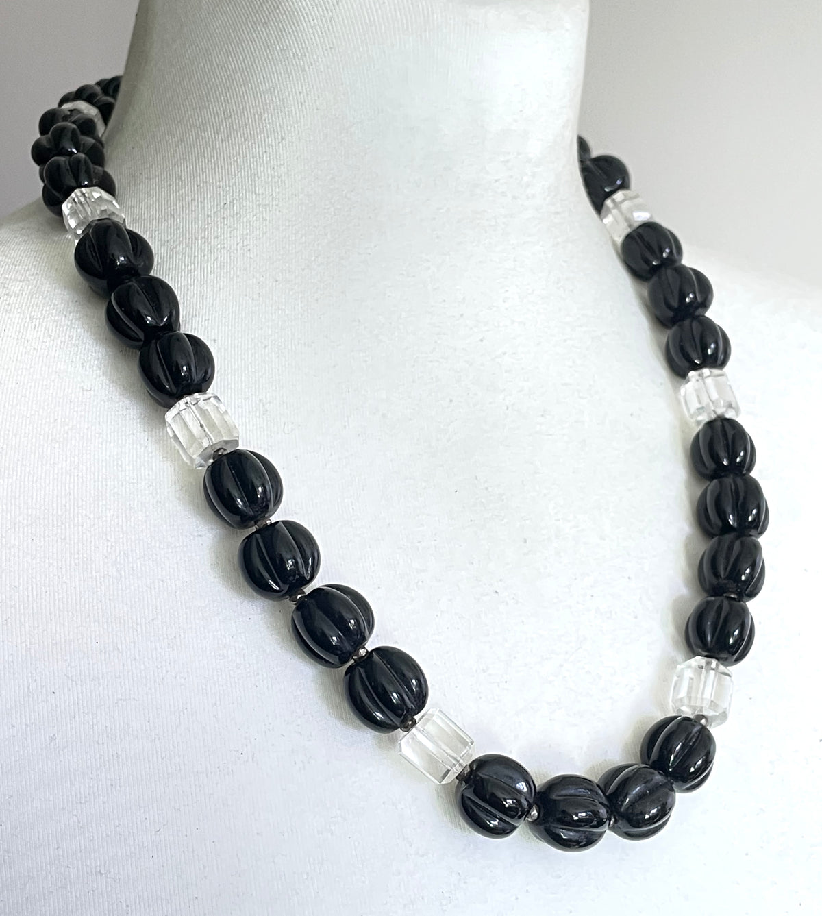 Vintage Art Deco chunky clear crystal faceted bead and carved black glass melon / pumpkin bead necklace, heavy poured glass, longer length