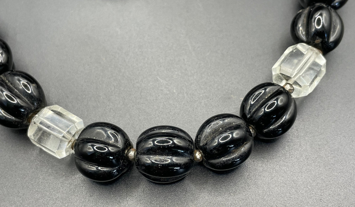 Vintage Art Deco chunky clear crystal faceted bead and carved black glass melon / pumpkin bead necklace, heavy poured glass, longer length