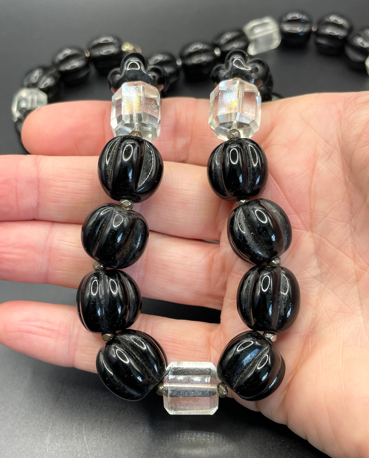 Vintage Art Deco chunky clear crystal faceted bead and carved black glass melon / pumpkin bead necklace, heavy poured glass, longer length