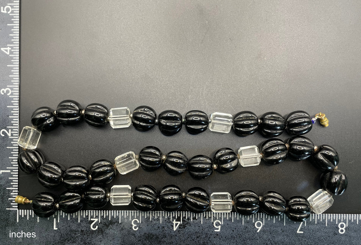 Vintage Art Deco chunky clear crystal faceted bead and carved black glass melon / pumpkin bead necklace, heavy poured glass, longer length