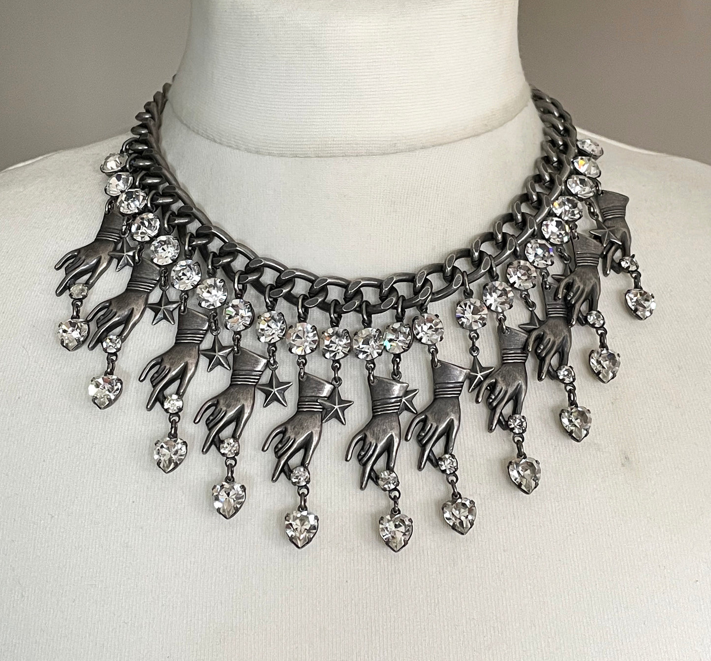 Vintage early Askew London hand, heart and star heavy fringe necklace, statement piece in chic dark silver tone & clear rhinestone, unique