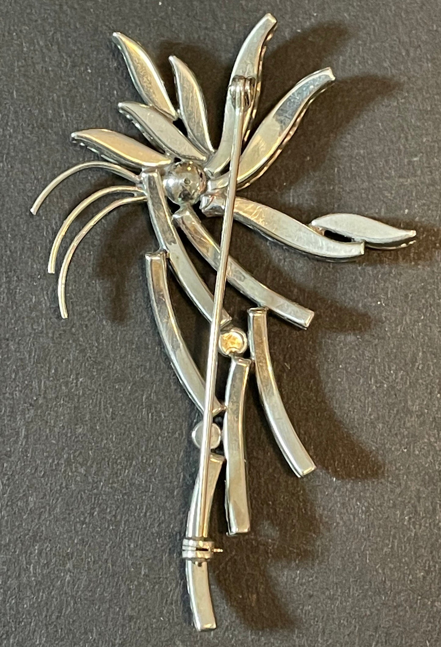 Huge vintage DRGM Schreiber & Hiller Art Deco channel set clear rhinestone and silver tone branch leaf flower machine age brooch (unsigned)