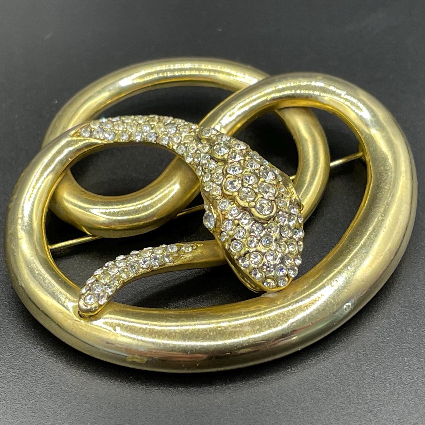 Large vintage Butler and Wilson (B&W) signed shiny gold tone and rhinestone snake brooch