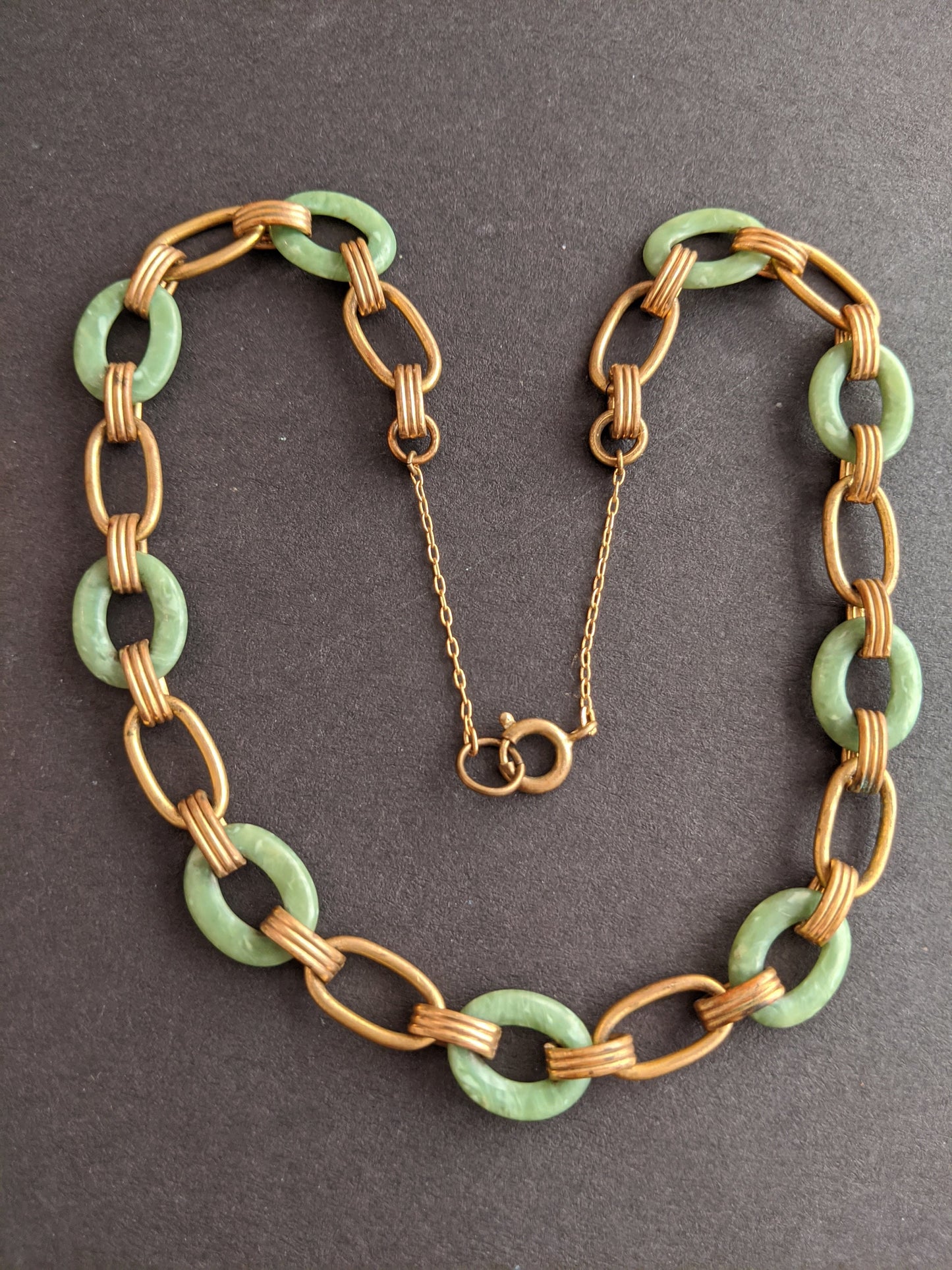 Vintage Jakob Bengel Art Deco machine age geometric gold tone and marbled green galalith ring necklace