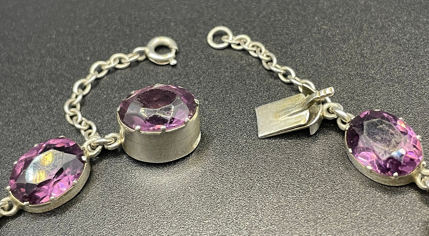 Antique fine sterling silver and amethyst paste collet set riviere style bracelet, bezel set, open backed large, oval purple stones, in box