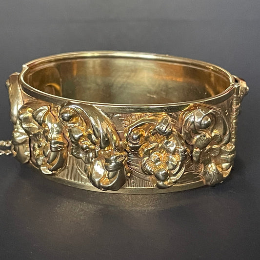 Vintage / antique ornate bright gold tone floral leaf design rigid bangle bracelet with stunning repousse decoration