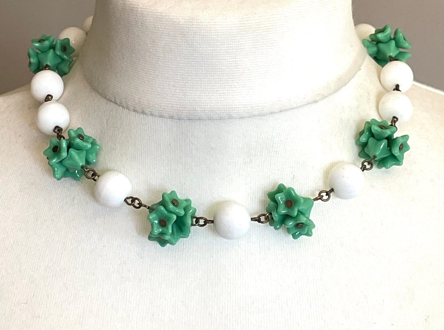 Vintage Art Deco green glass flower and large white milk glass bead, delicate glass necklace