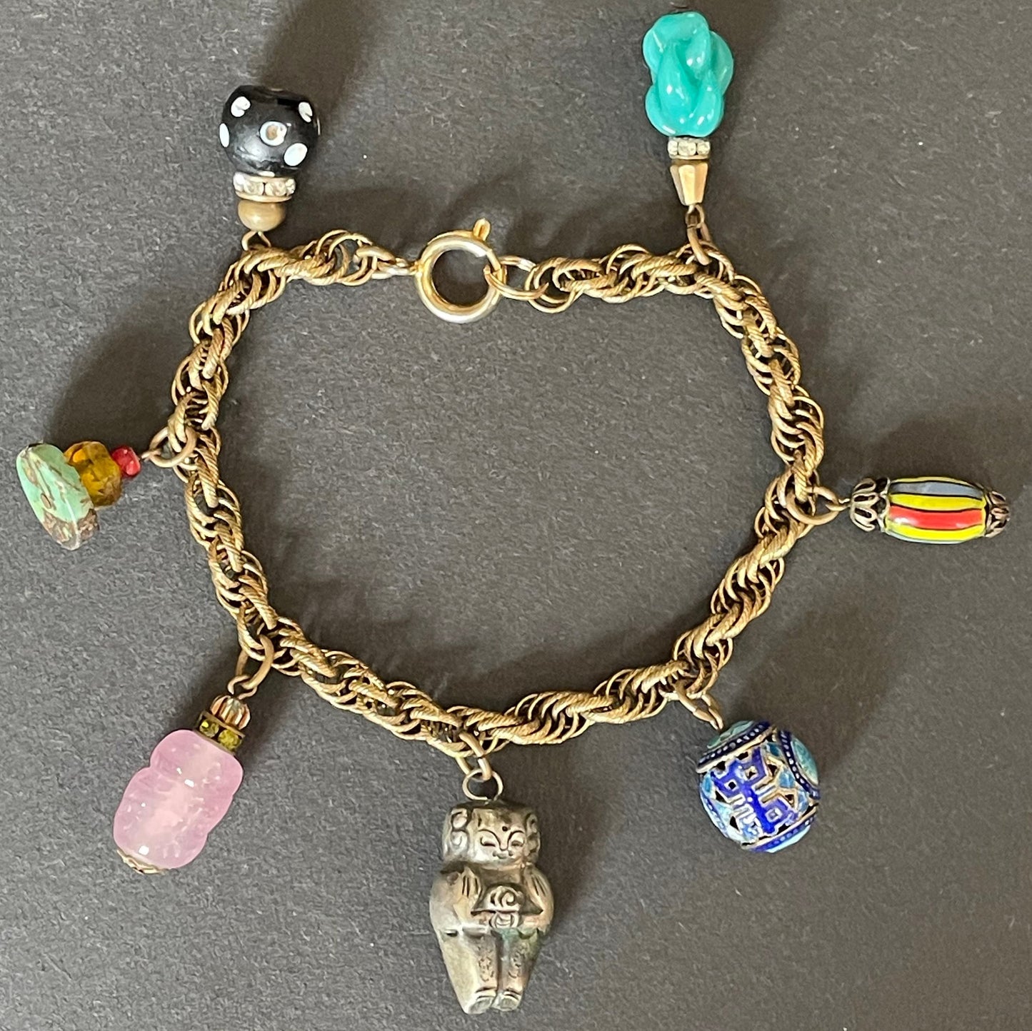 Vintage early Miriam Haskell charm bracelet or anklet with fancy gold tone rope chain and gorgeous Chinese bead and glass charms