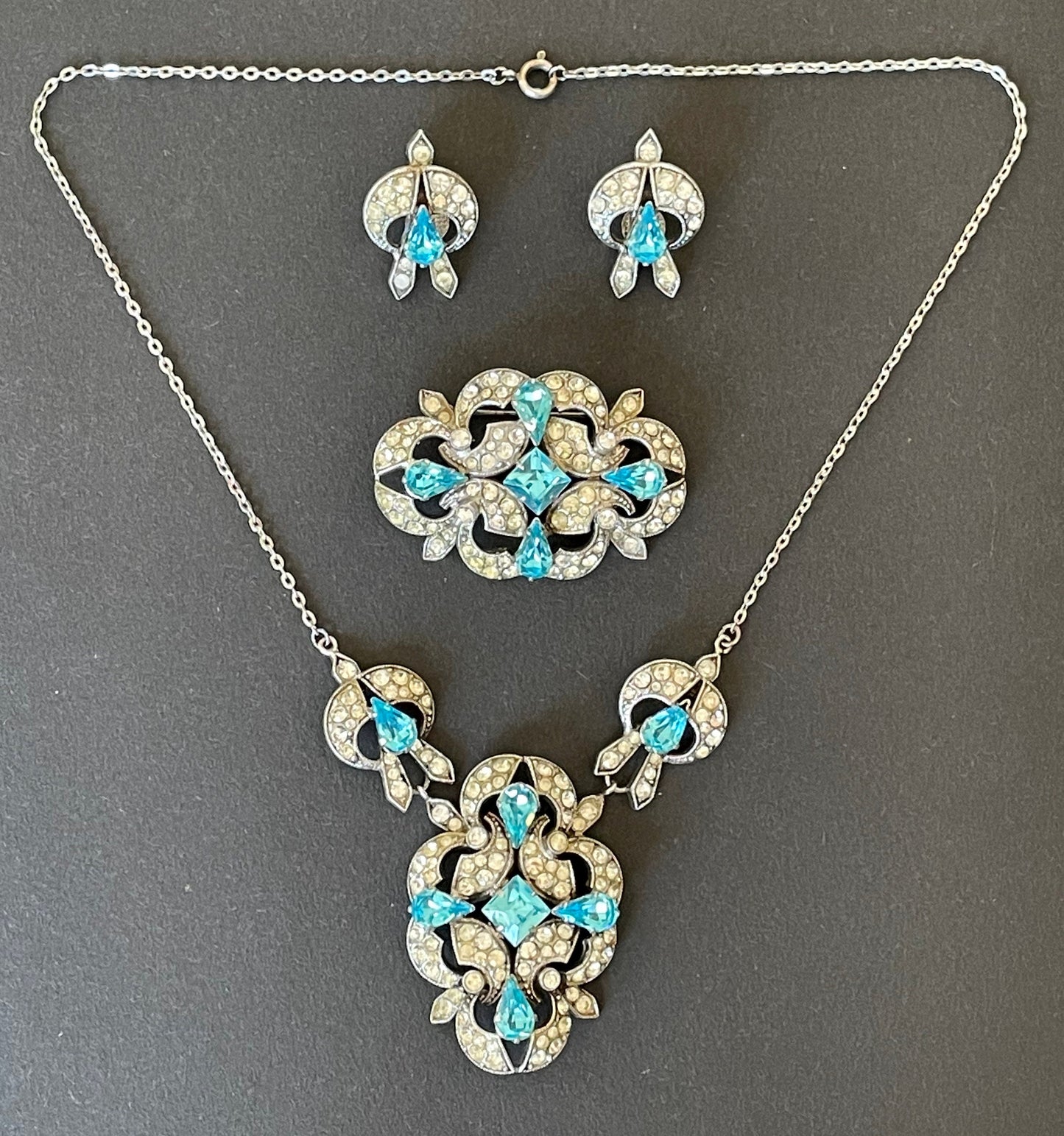 Vintage Art Deco bright turquoise aqua blue and clear crystal paste necklace, brooch and clip-on earrings set, chrome geometric design