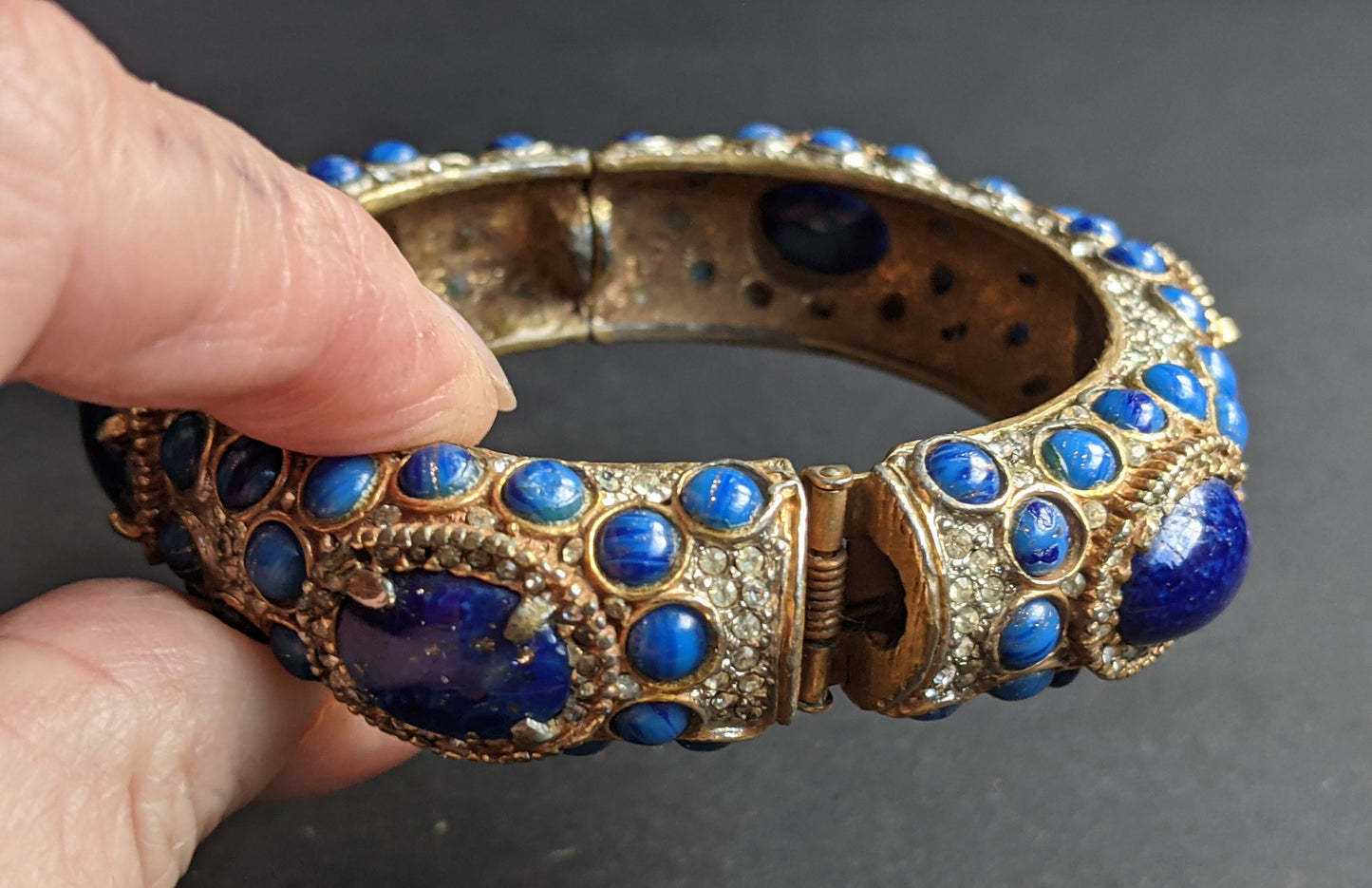 Vintage Kenneth Jay Lane KJL classic 1960s signed mogul style cabochon & rhinestone encrusted hinged bangle, lapis lazuli blue glass stones