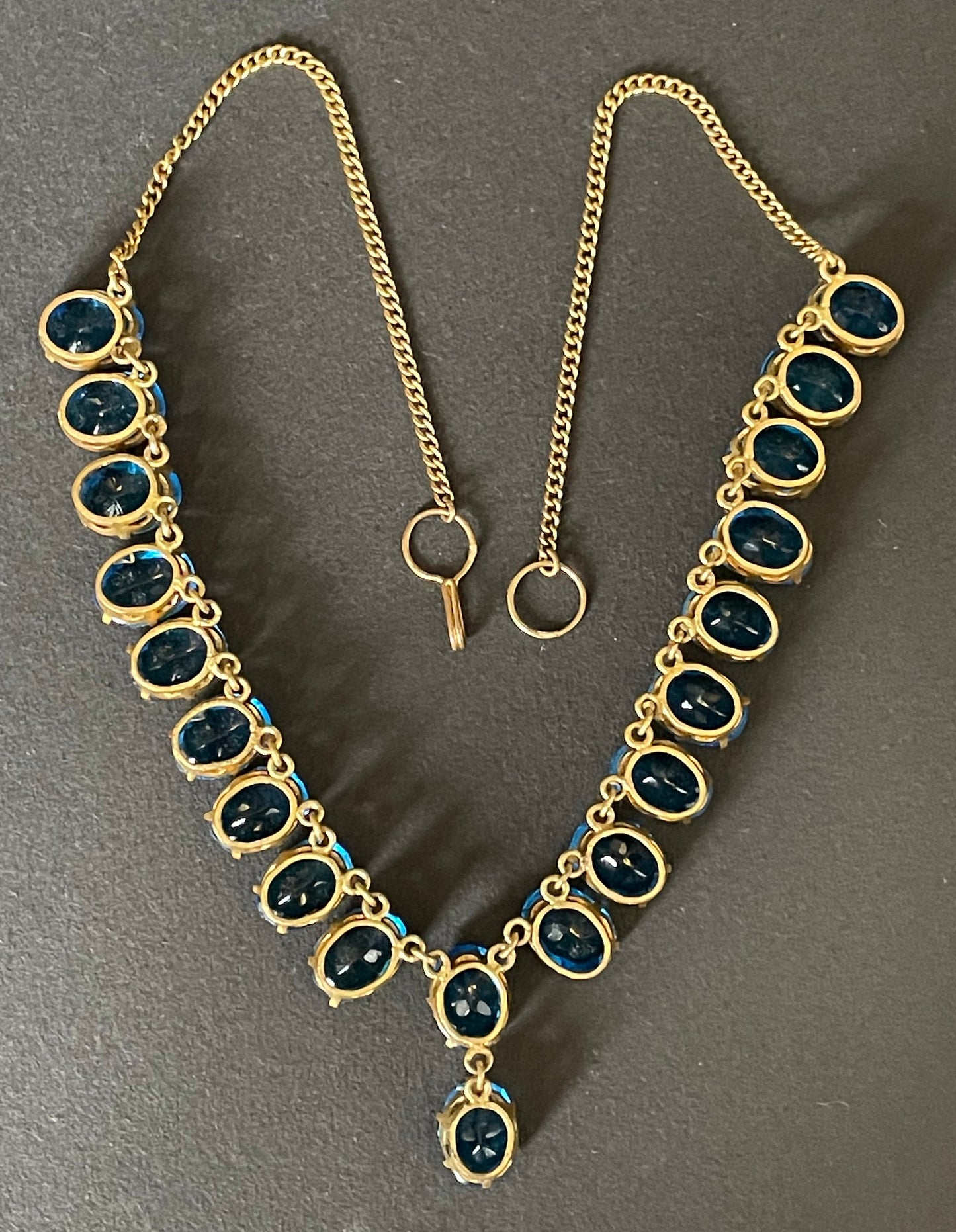 Antique Victorian bright sapphire blue paste riviere Y necklace, open backed large stones