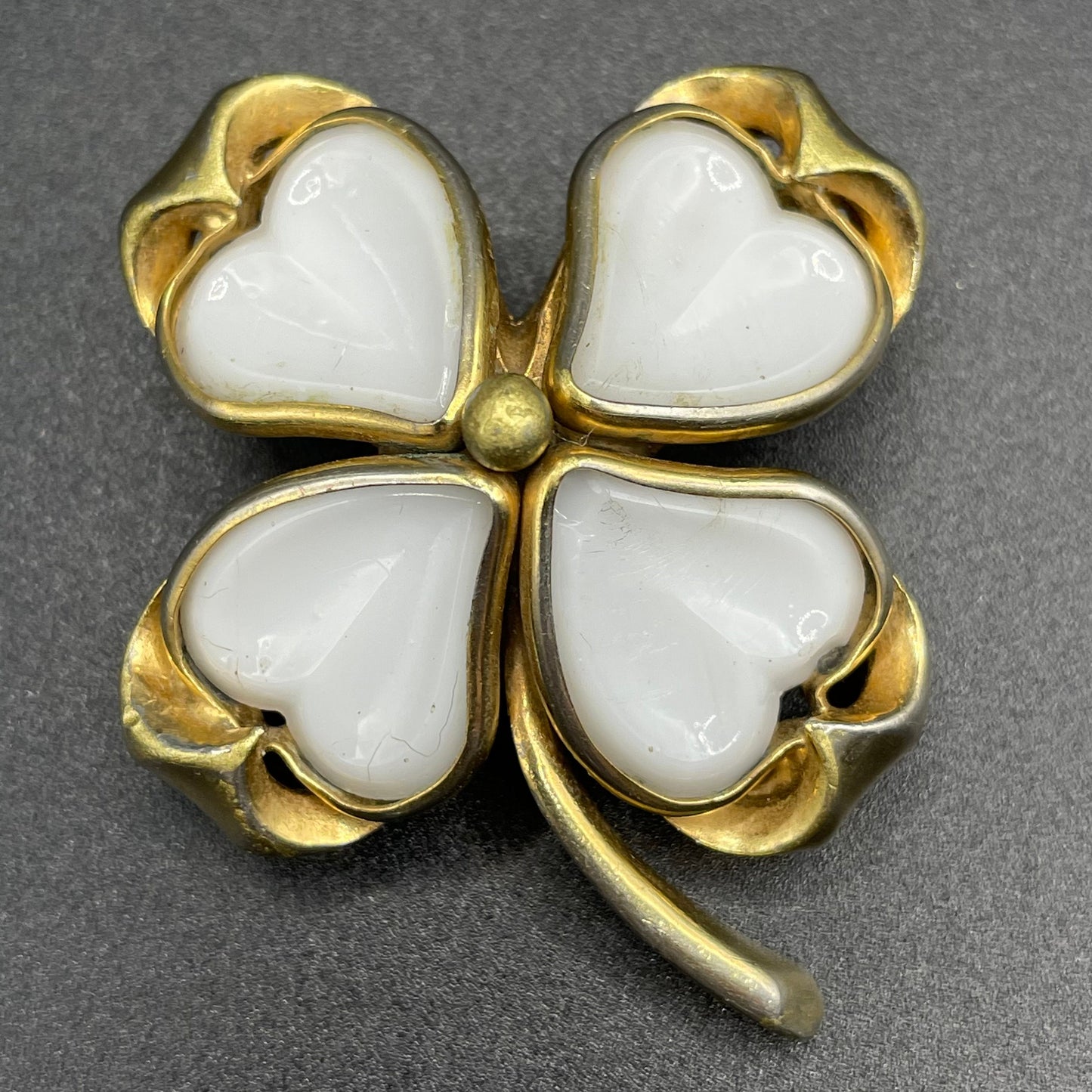 Vintage milk white poured glass and gold tone four leaf clover or shamrock petite brooch, as found, possibly unsigned Trifari