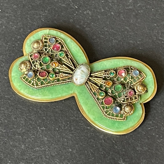 Vintage Art Deco bow shaped brooch, green galalith, gold tone with filigree and multi-coloured rhinestones Max Neiger brothers style