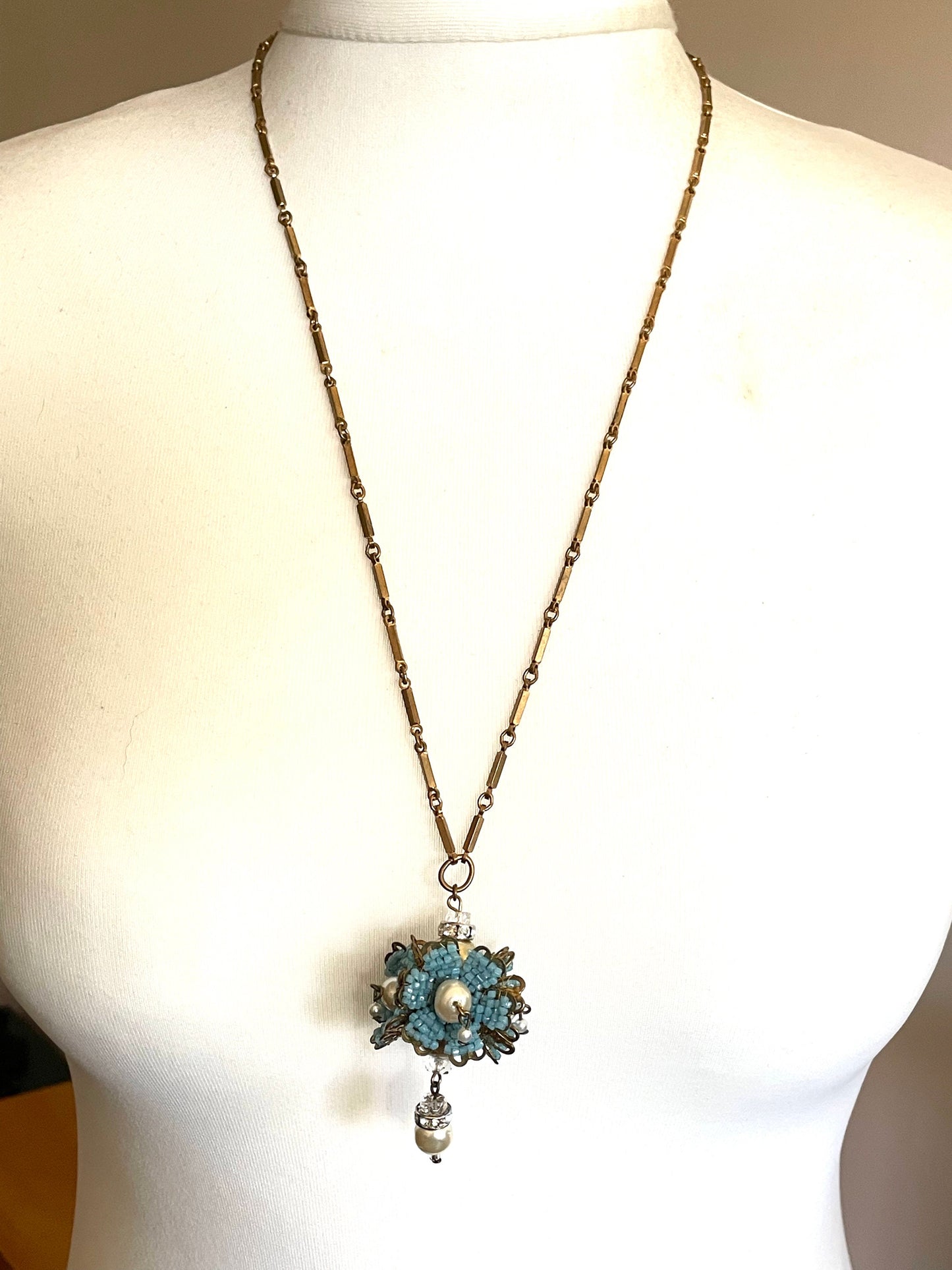 Vintage Miriam Haskell elaborate glass beaded floral  long pendant necklace with intricate turquoise blue micro beading and white faux pearl