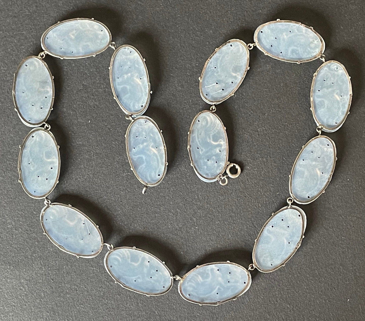 Vintage sterling silver and light blue moulded glass large oval stone riviere necklace bezel set, open backed, cockerel motif