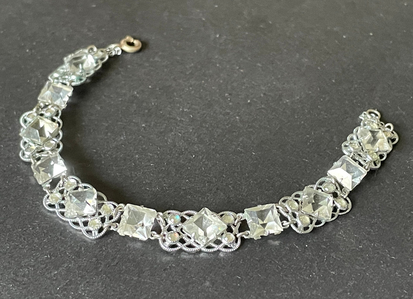 Vintage bracelet, Art Deco paste rhinestone and open backed princess cut crystal geometric silver tone filigree cocktail bracelet