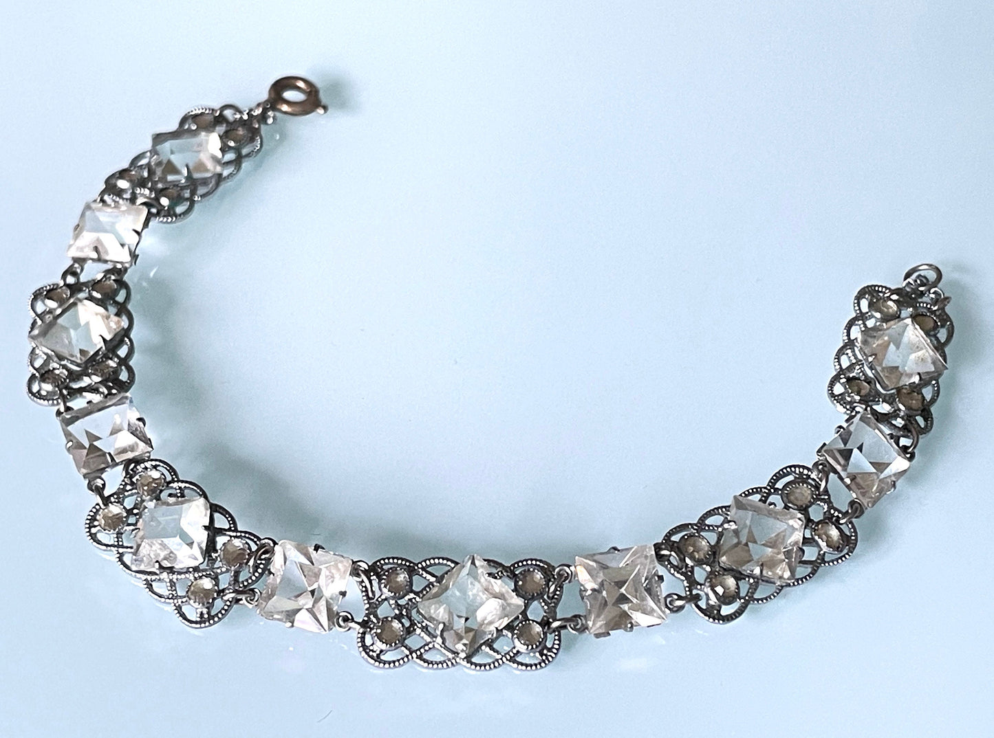 Vintage bracelet, Art Deco paste rhinestone and open backed princess cut crystal geometric silver tone filigree cocktail bracelet