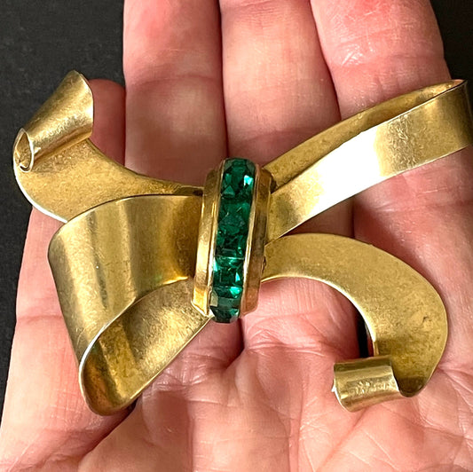 Vintage signed Coro sterling craft emerald green crystal rhinestone and gold vermeil silver bow brooch from the 1940s