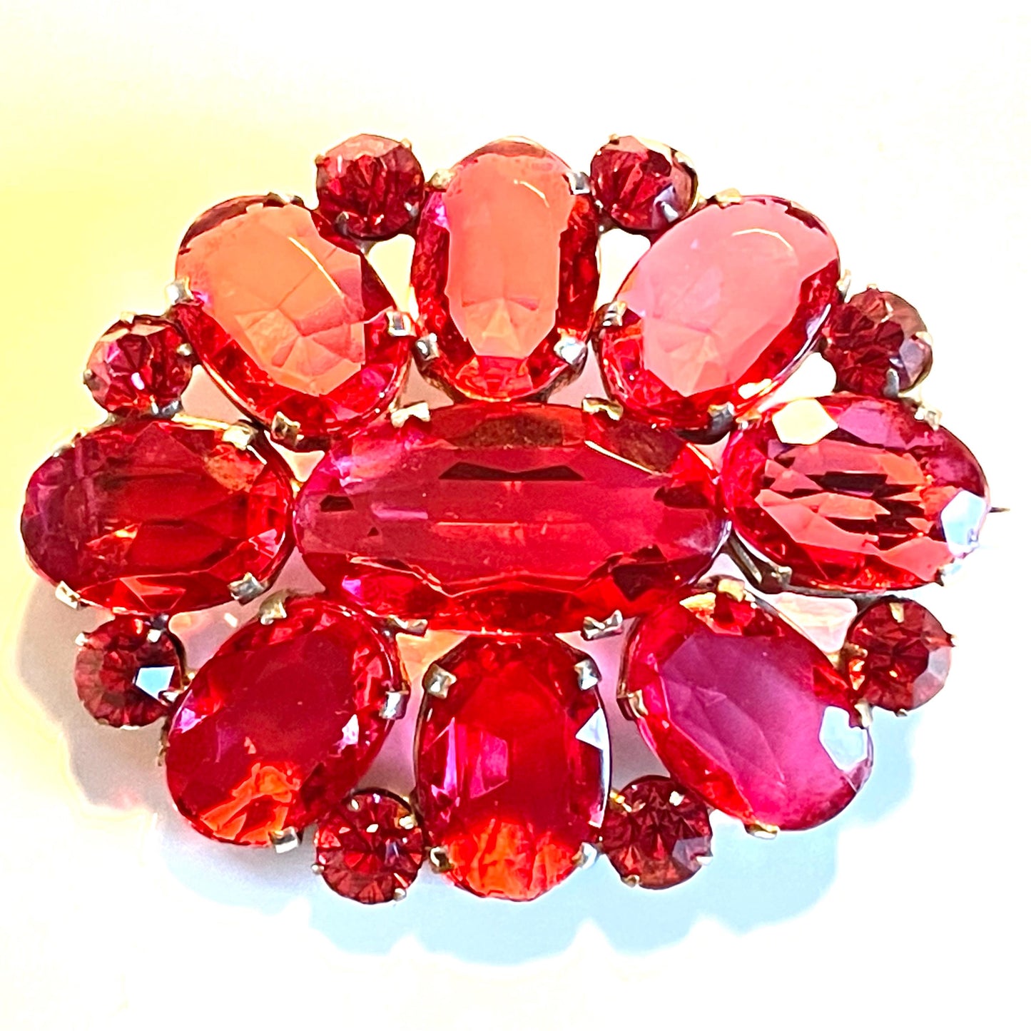 Large vintage Art Deco ruby pink glass rhinestone, open-backed, pale antique gold tone brooch pin, stunning pink colour