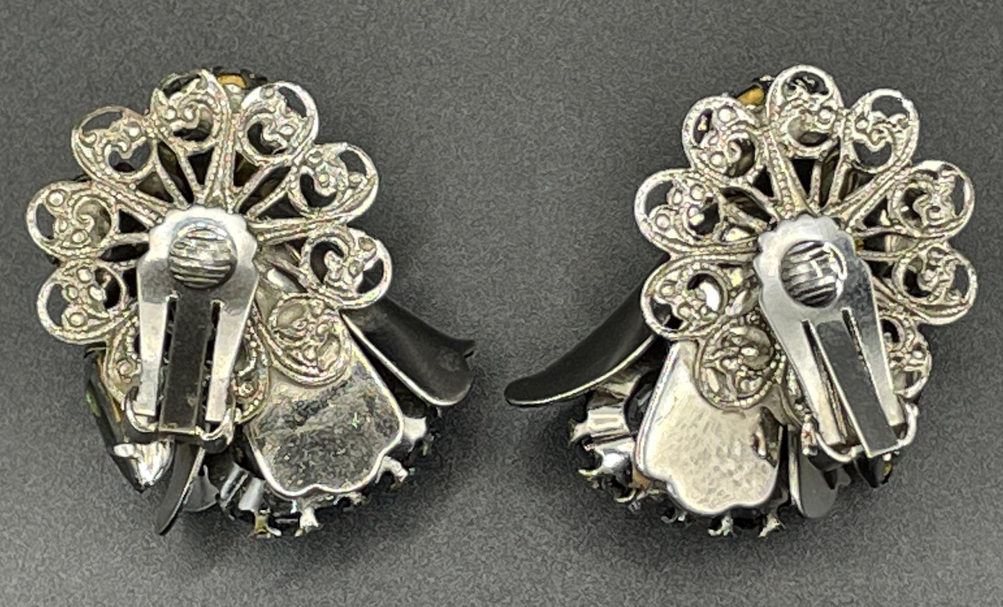 Vintage large rhinestone tulip flower design clip on earrings, silver tone with grey / green rhinestones and filigree backs