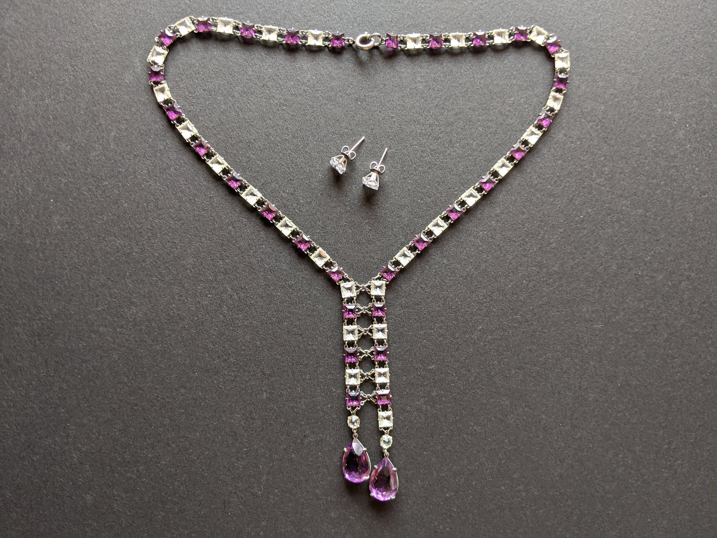 Vintage Art Deco clear & amethyst purple paste silver tone riviere negligee necklace with open backed bezel set square rhinestones