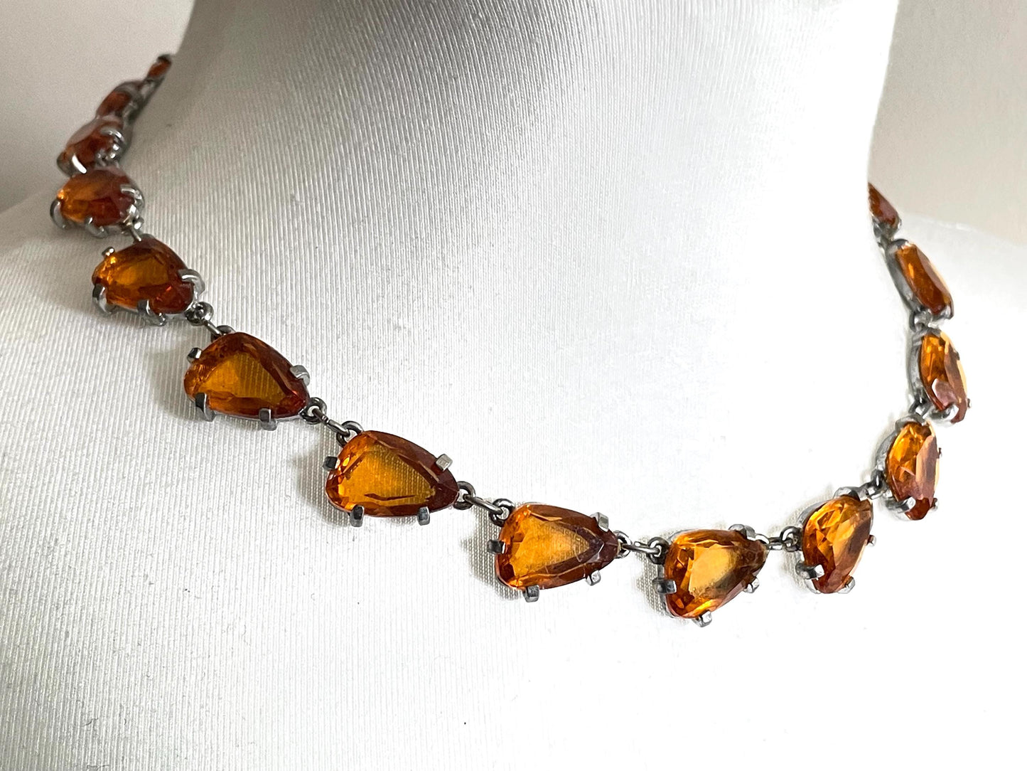 Vintage signed Sphinx citrine yellow / topaz orange glass riviere necklace, triangle shaped crystals set open-backed in silver tone settings