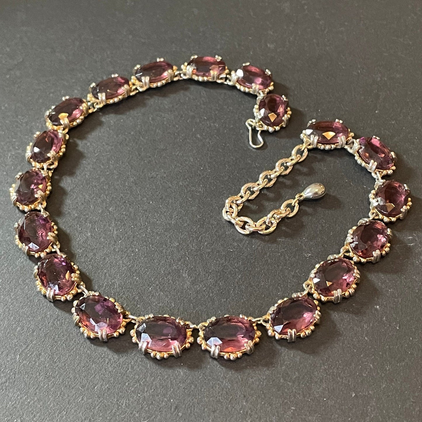 Vintage Sphinx amethyst purple glass riviere necklace, heavy, bezel set, open-backed stones in ornate gold tone setting