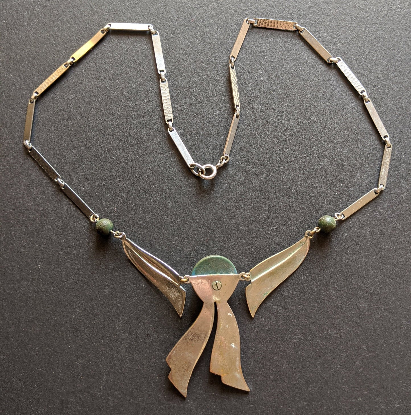 Vintage Jakob Bengel Art Deco machine age chrome and olive green galalith bow necklace