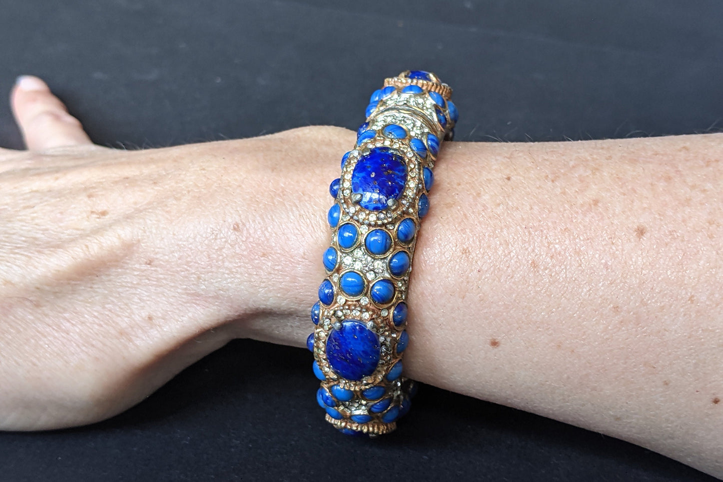 Vintage Kenneth Jay Lane KJL classic 1960s signed mogul style cabochon & rhinestone encrusted hinged bangle, lapis lazuli blue glass stones