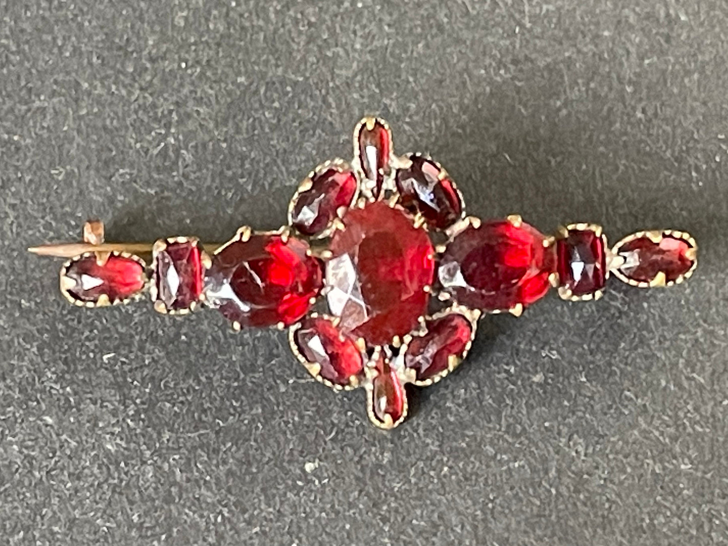 Vintage / antique Bohemian garnet brooch, different shaped stones set in gold tone, early Art Deco period 1920s