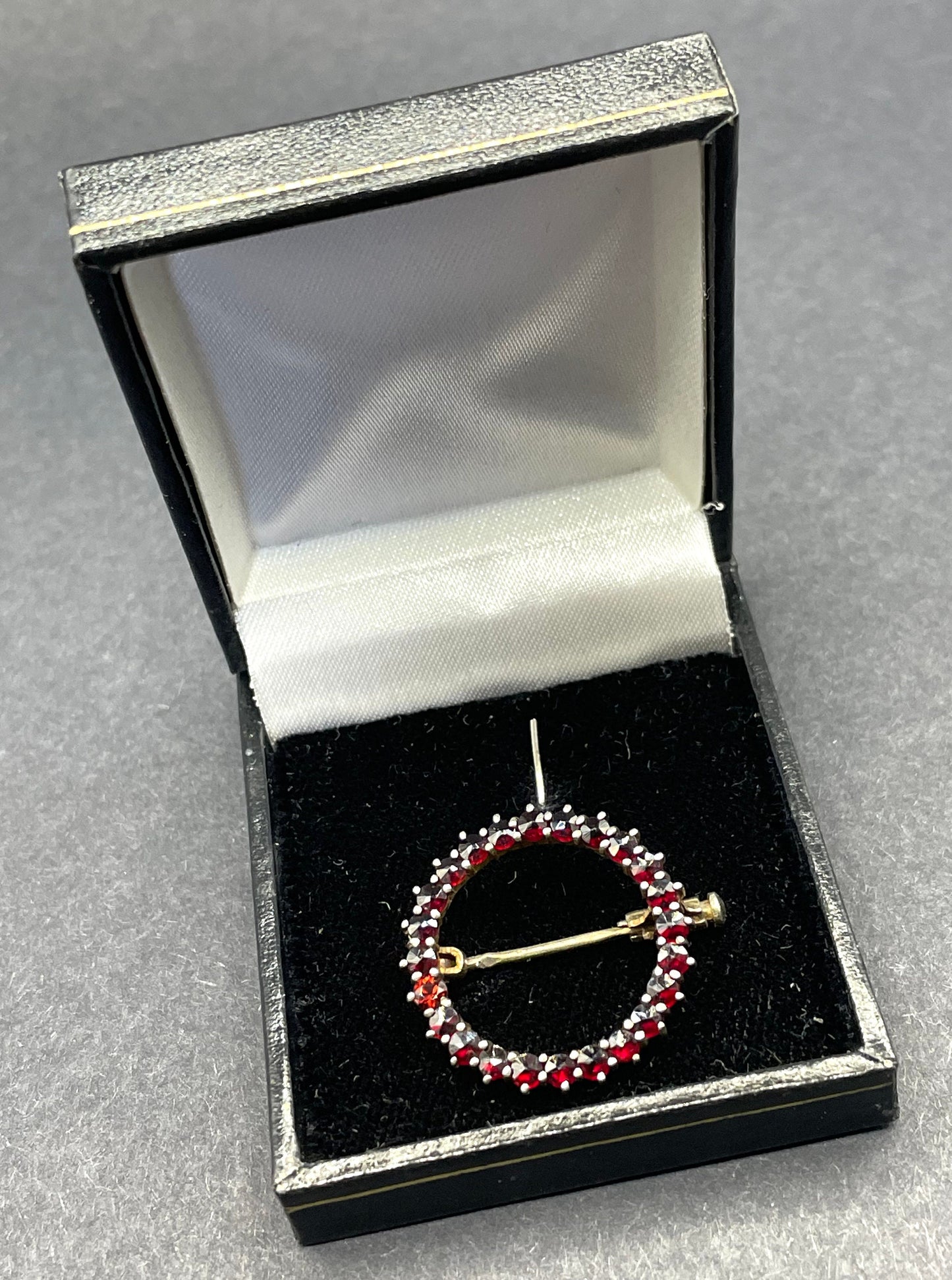 Petite vintage / antique Bohemian garnet circle brooch, rose cut stones set in hallmarked sterling silver gilt, trombone clasp