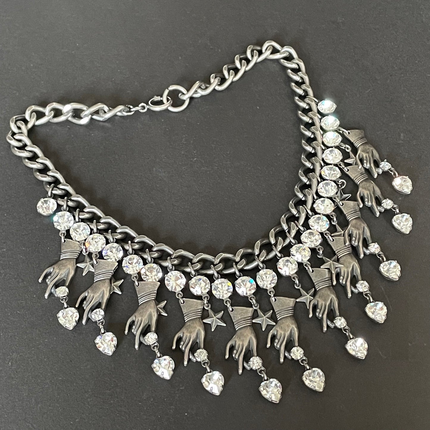 Vintage early Askew London hand, heart and star heavy fringe necklace, statement piece in chic dark silver tone & clear rhinestone, unique