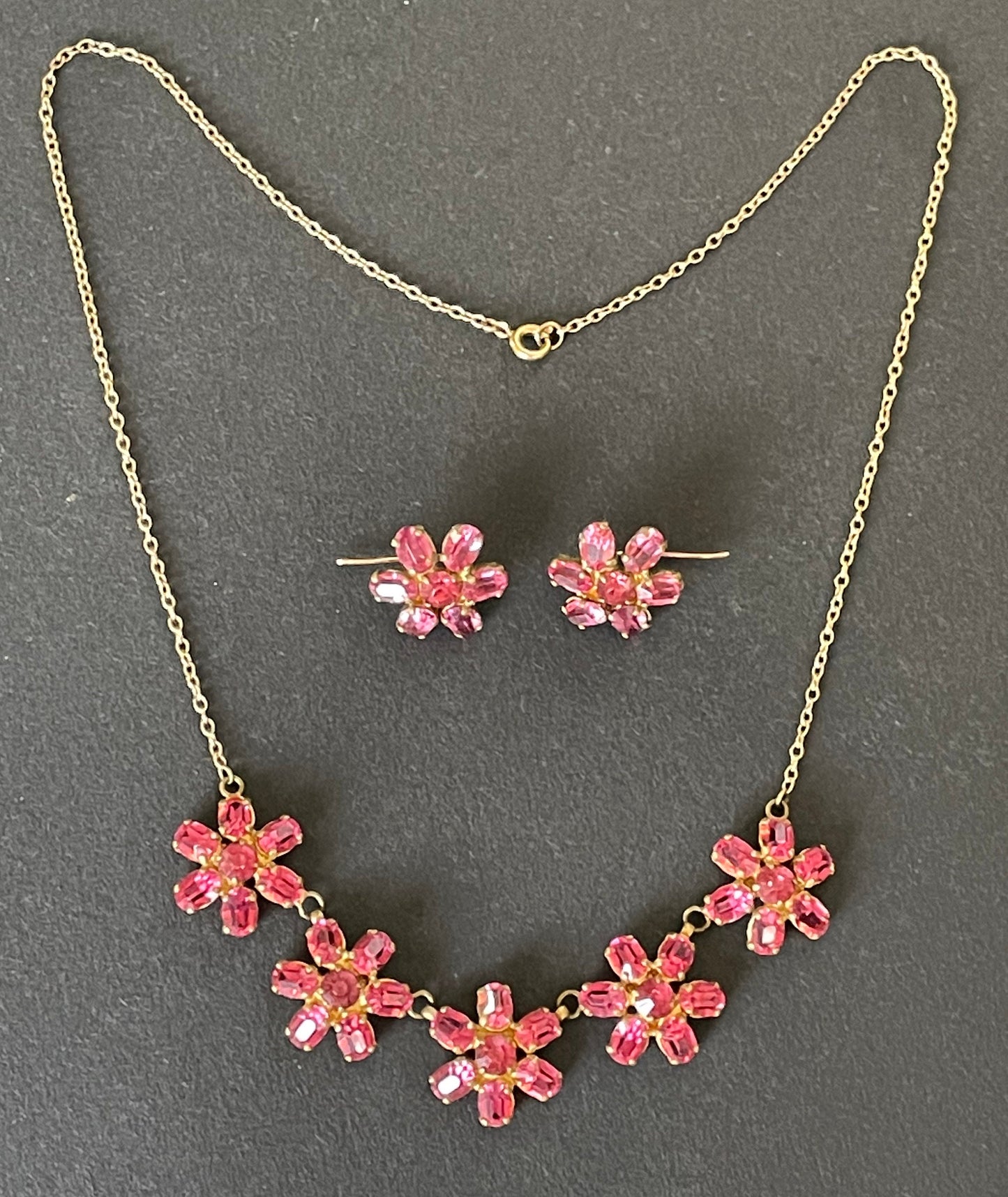 Vintage crystal floral design pink ruby coloured rhinestone necklace and earrings set- bright rhinestones set open-backed in gold tone