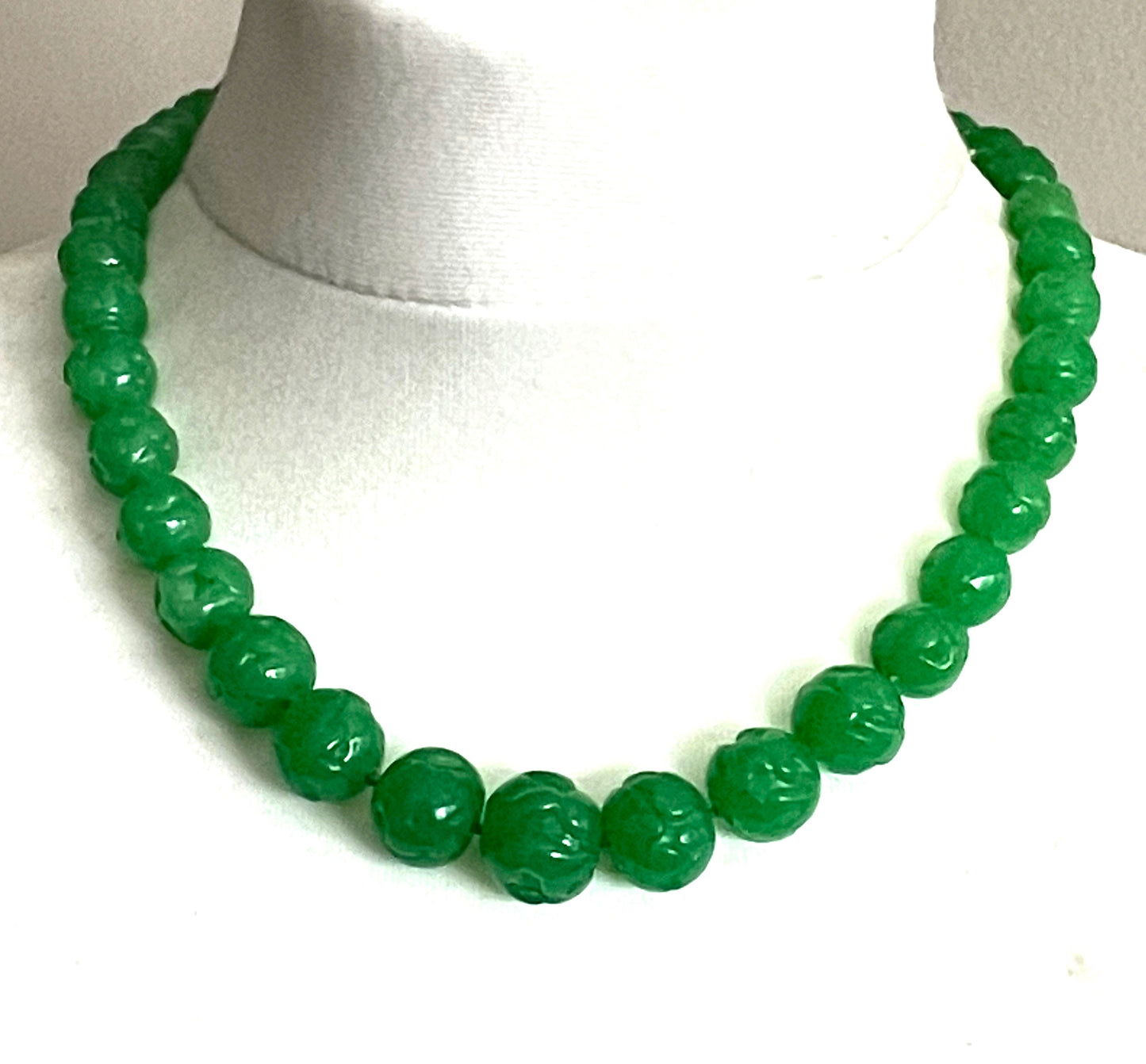 Vintage bright green jade coloured moulded glass graduated bead necklace, hand-knotted with gold tone fish hook clasp