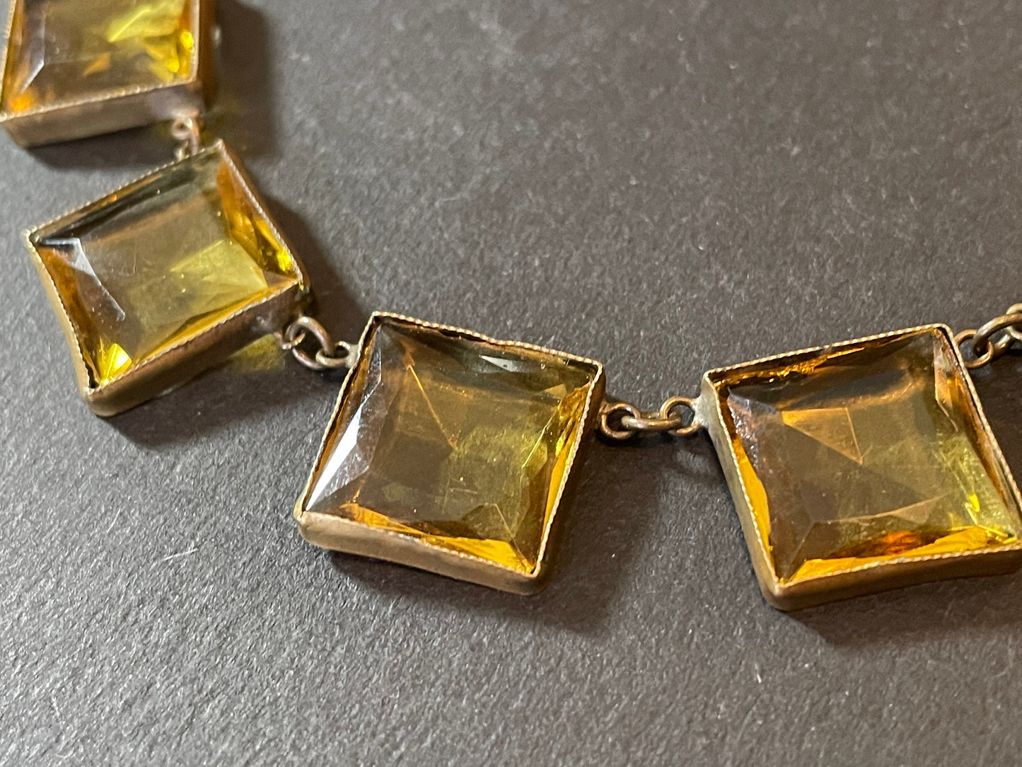 Antique late 19th century citrine yellow / orange crystal riviere necklace, huge bezel set open backed princess cut square rhinestones