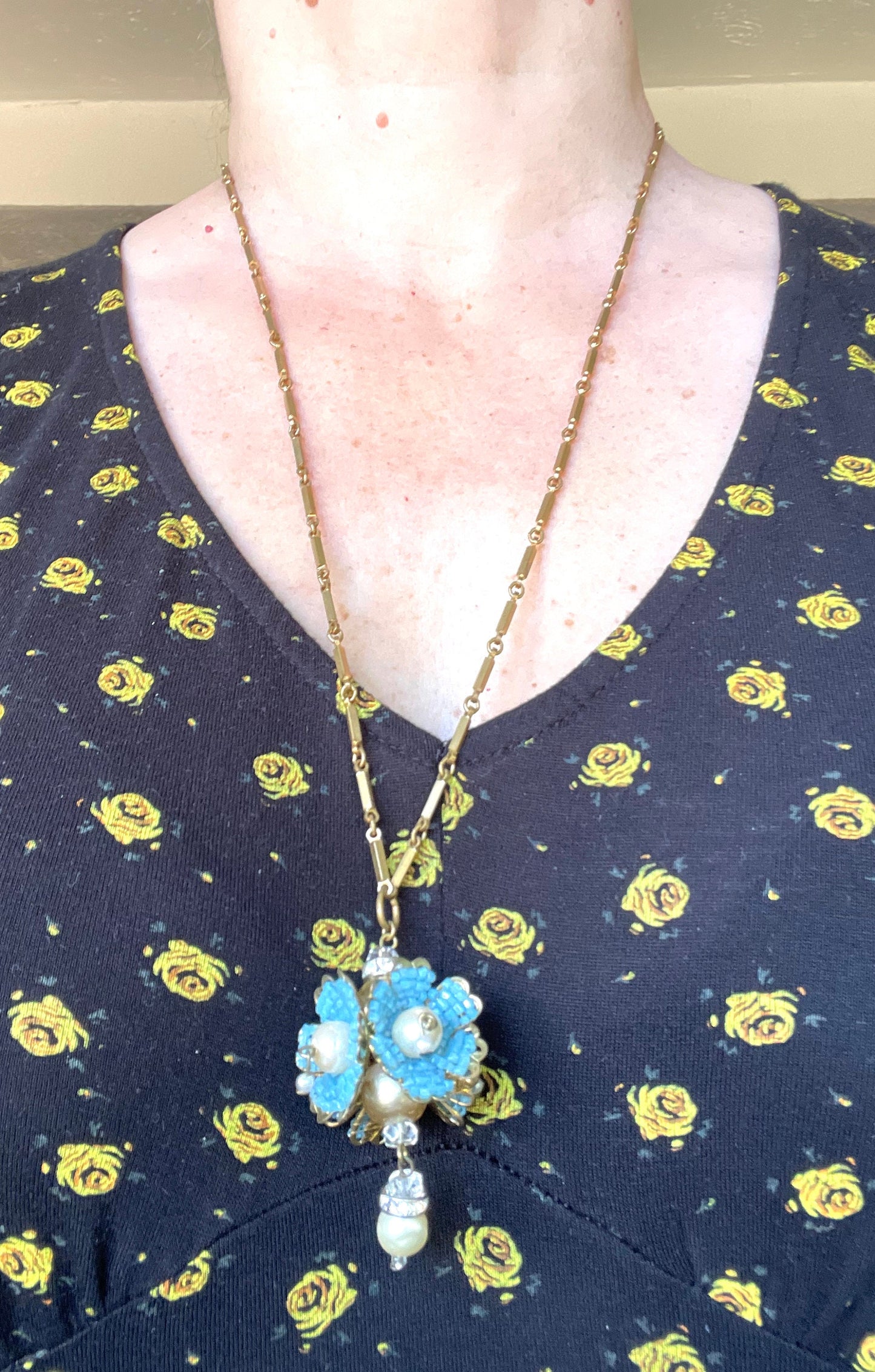 Vintage Miriam Haskell elaborate glass beaded floral  long pendant necklace with intricate turquoise blue micro beading and white faux pearl