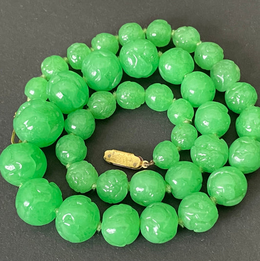 Vintage bright green jade coloured moulded glass graduated bead necklace, hand-knotted with gold tone fish hook clasp