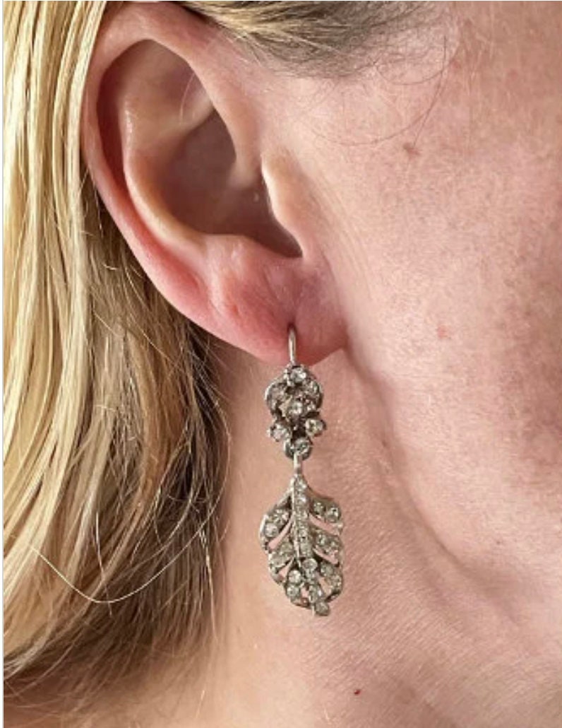 Vintage choice of pairs of clear rhinestone paste and silver tone statement earrings for pierced ears