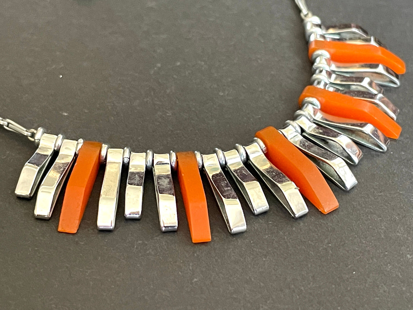 Vintage Jakob Bengel Art Deco machine age necklace, beautiful bright orange galalith 3D geometric shapes with shiny silver tone chrome