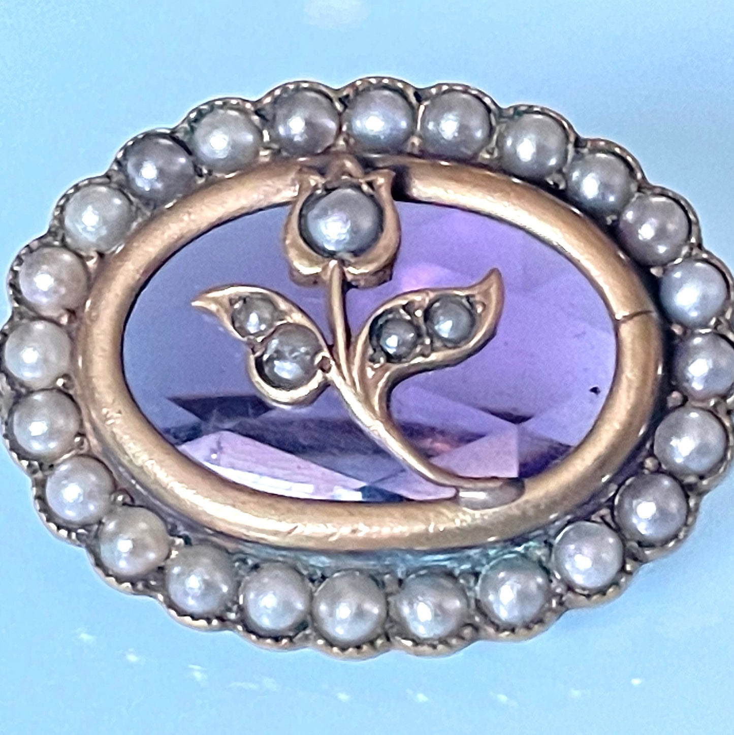 Adorable antique Georgian gold tone yellow metal, seed pearl and amethyst purple crystal paste cabochon brooch lace pin