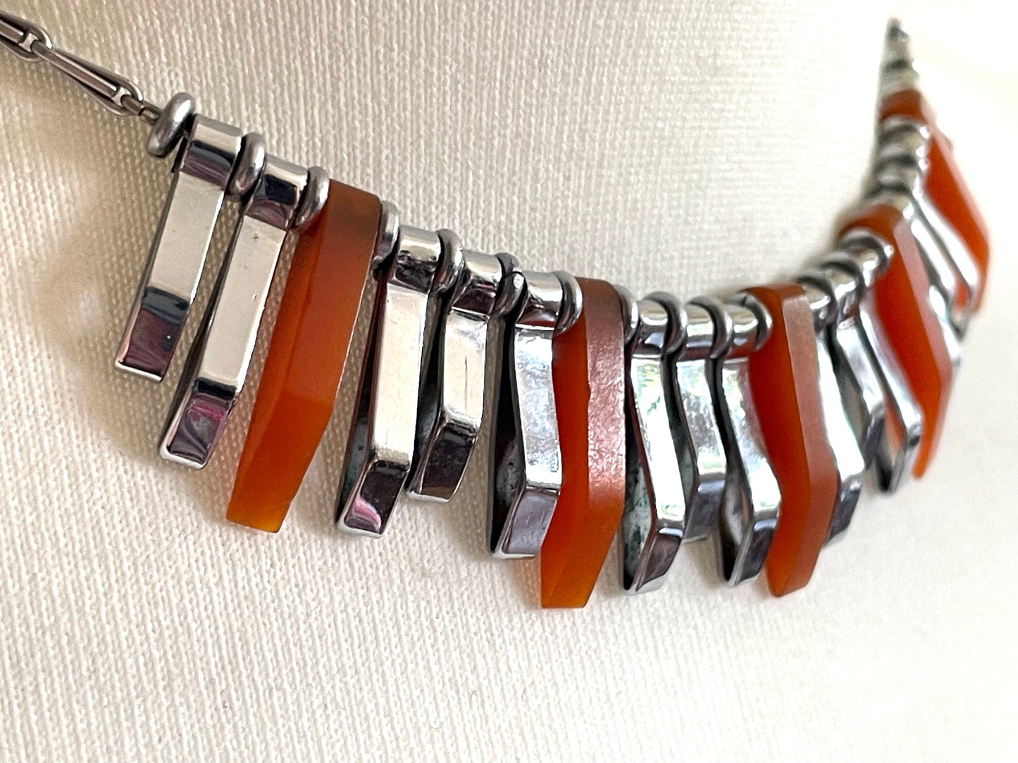 Vintage Jakob Bengel Art Deco machine age necklace, beautiful bright orange galalith 3D geometric shapes with shiny silver tone chrome