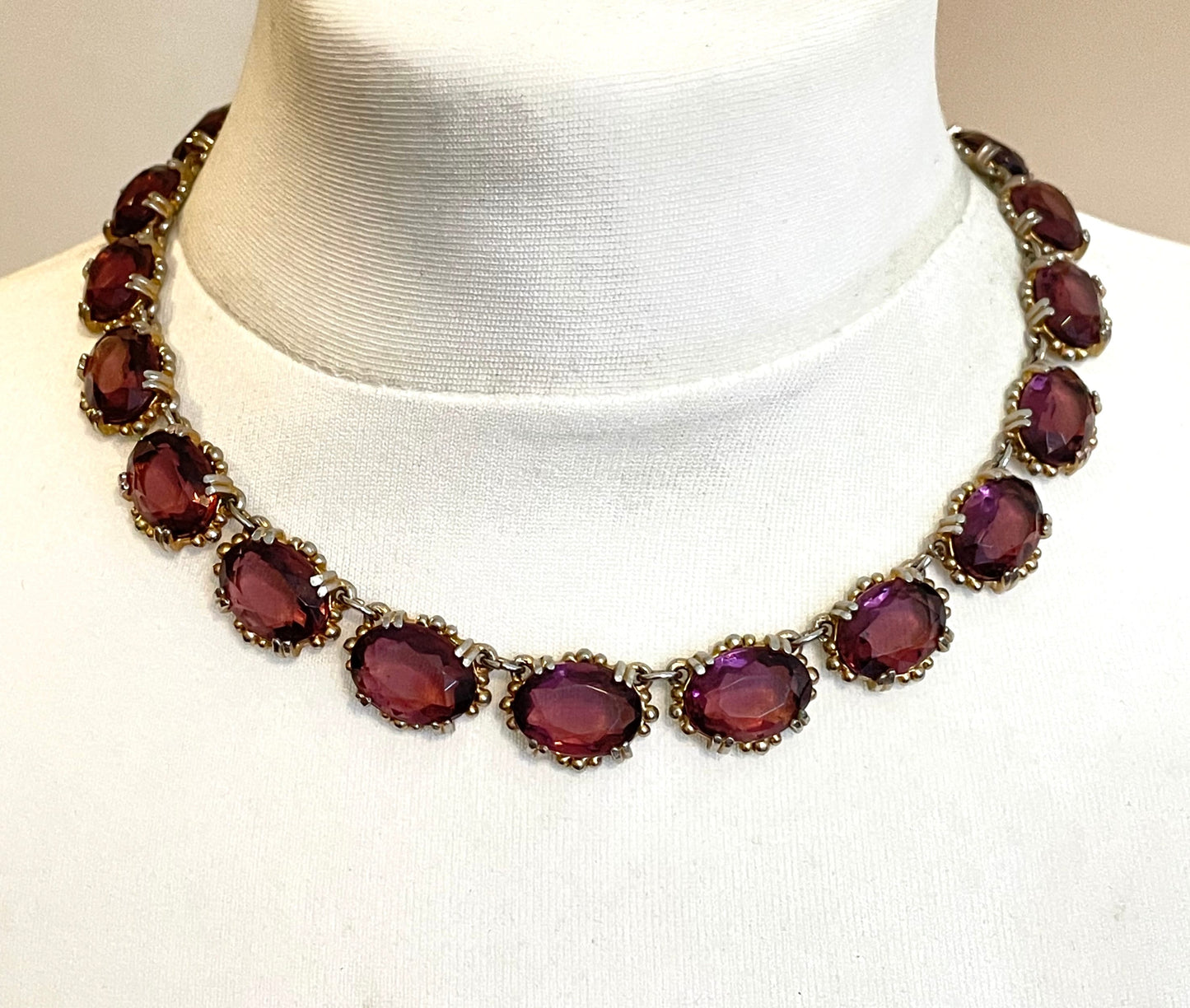 Vintage Sphinx amethyst purple glass riviere necklace, heavy, bezel set, open-backed stones in ornate gold tone setting