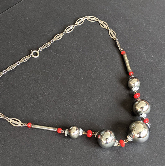 Vintage Art Deco silvered hollow blown glass beads and chrome machine age necklace with red glass accent beads