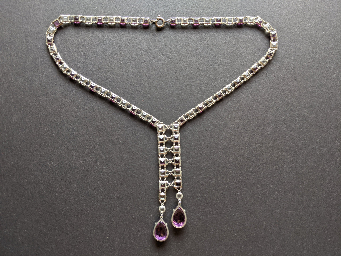 Vintage Art Deco clear & amethyst purple paste silver tone riviere negligee necklace with open backed bezel set square rhinestones