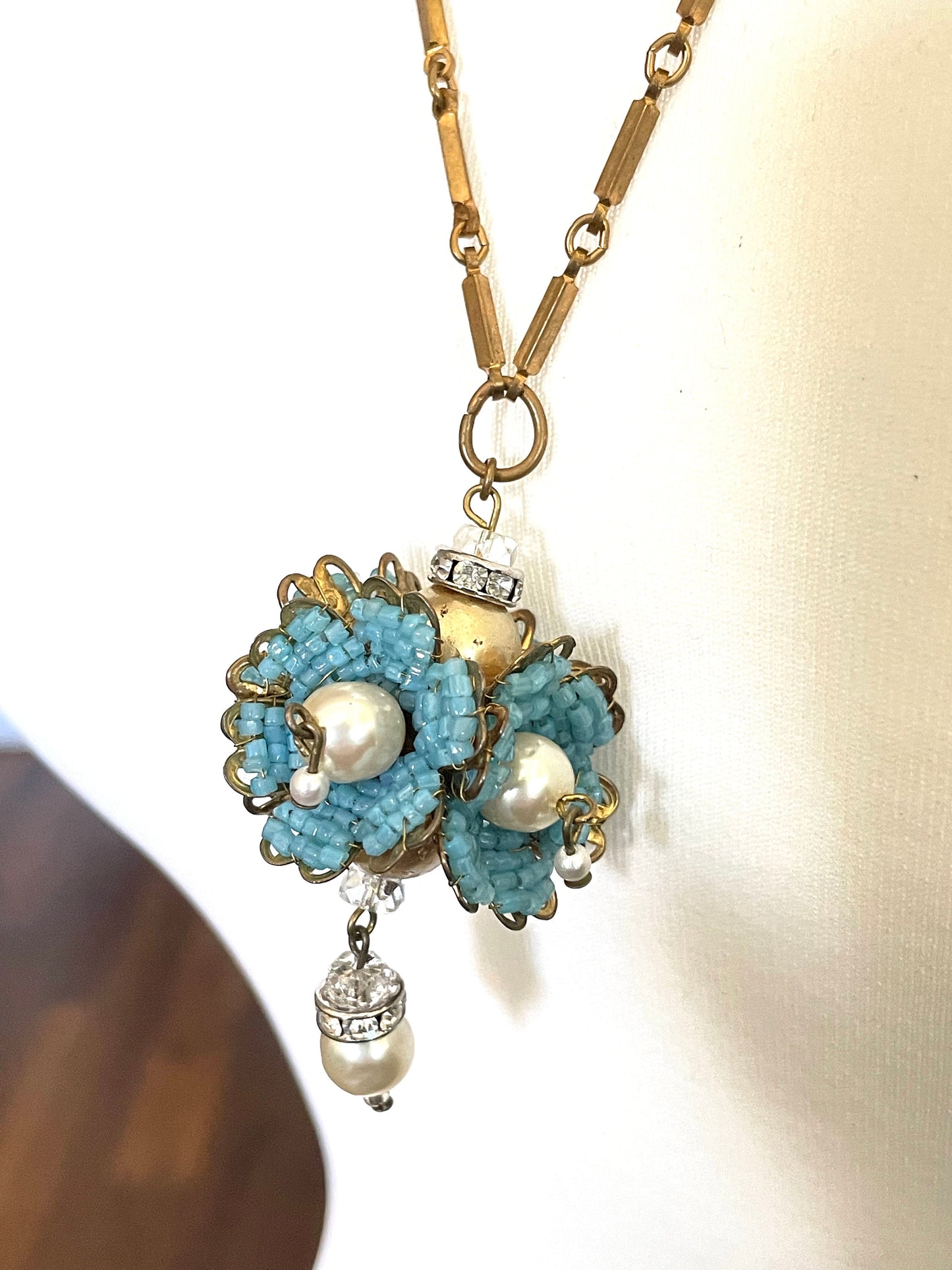 Vintage Miriam Haskell elaborate glass beaded floral  long pendant necklace with intricate turquoise blue micro beading and white faux pearl