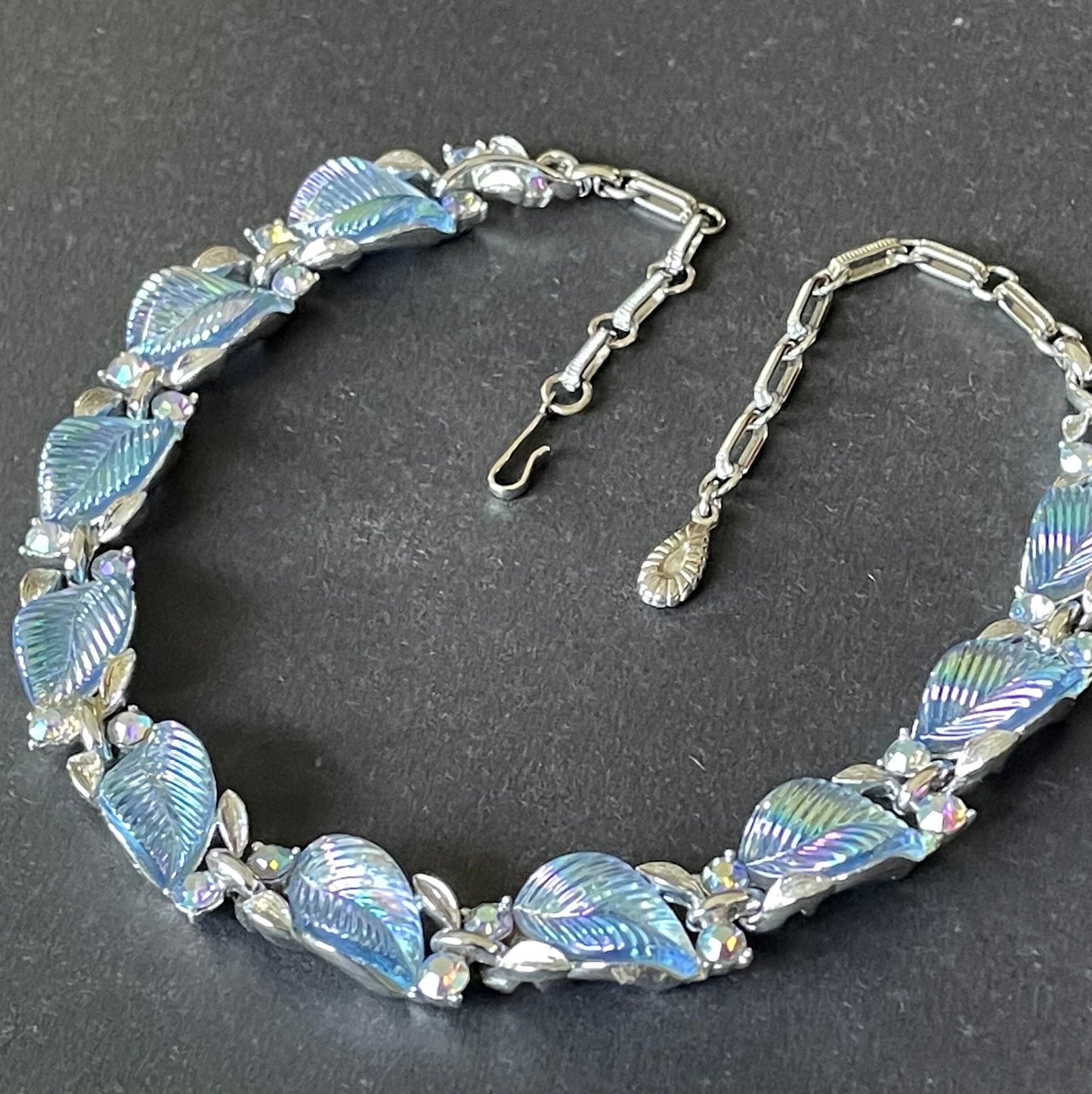 Vintage signed Lisner blue aurora borealis glass leaf, rhinestone and shiny silver tone collar choker necklace