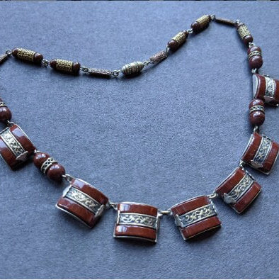 Vintage Art Deco machine age chrome, burgundy / brown glass geometric necklace with filigree detail