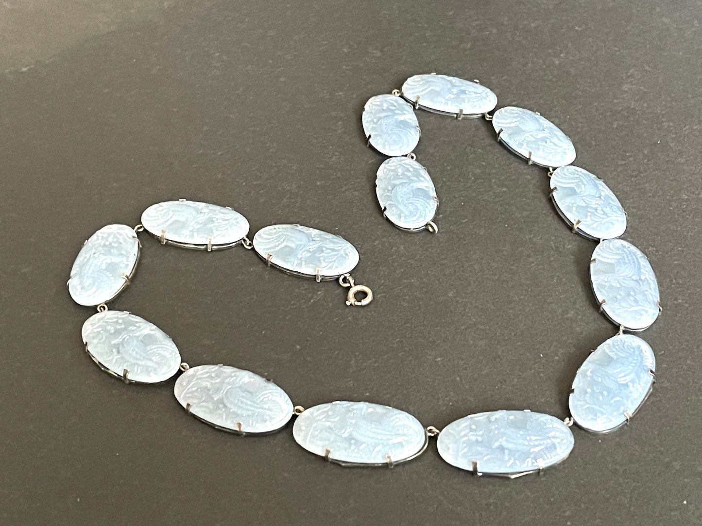 Vintage sterling silver and light blue moulded glass large oval stone riviere necklace bezel set, open backed, cockerel motif